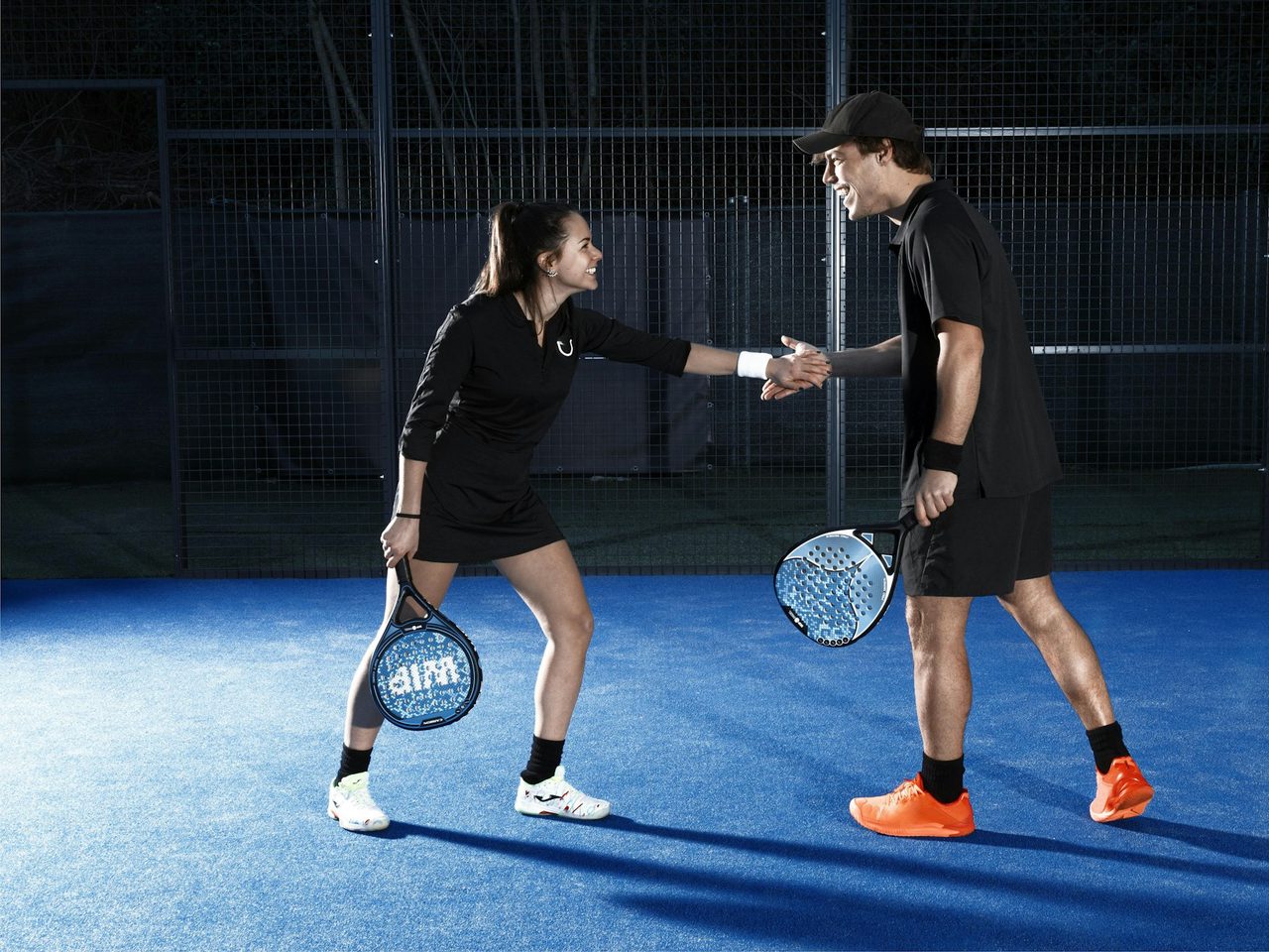 Coached padel session on court