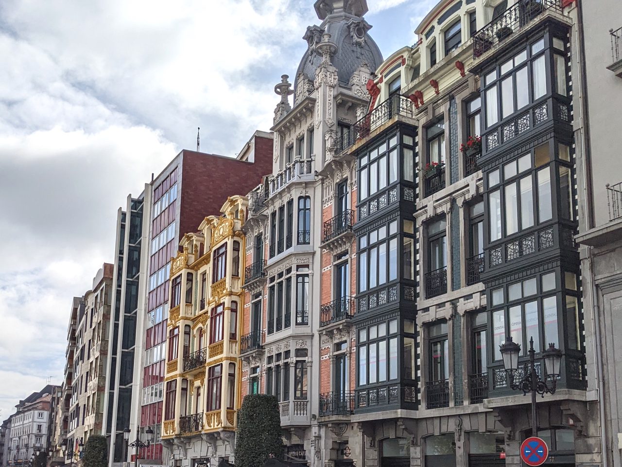 Ornate façades and the Ópera Café on Calle Uría, Oviedo